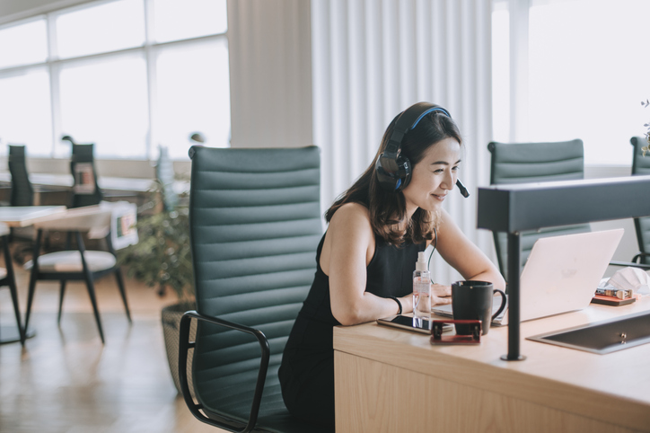 CRM system woman talking to clients on the call 